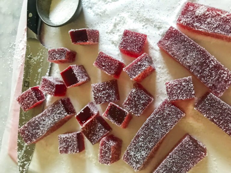 Coating cranberry candy in sugar