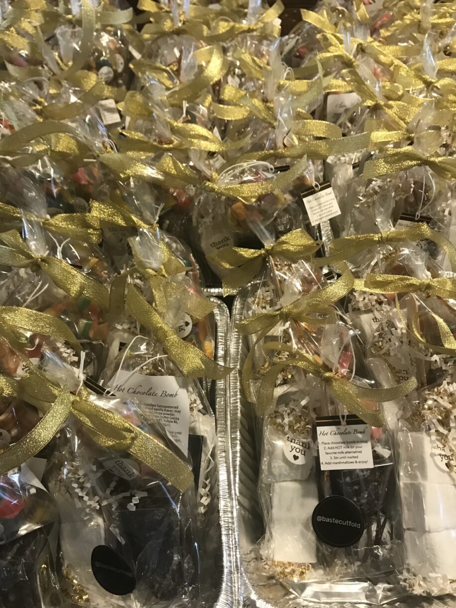 Hot chocolate bomb bags tied with gold ribbon
