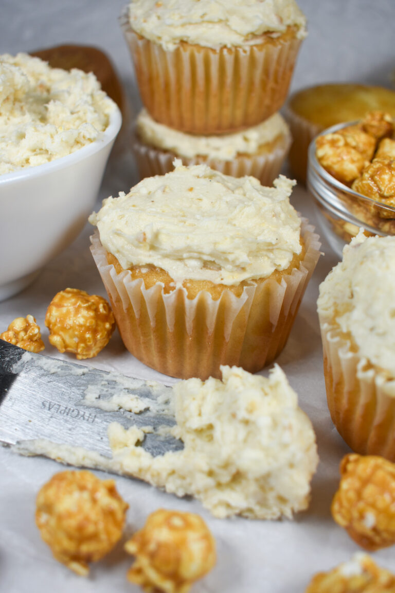 Vanilla cupcakes, caramel popcorn buttercream, and pieces of caramel corn