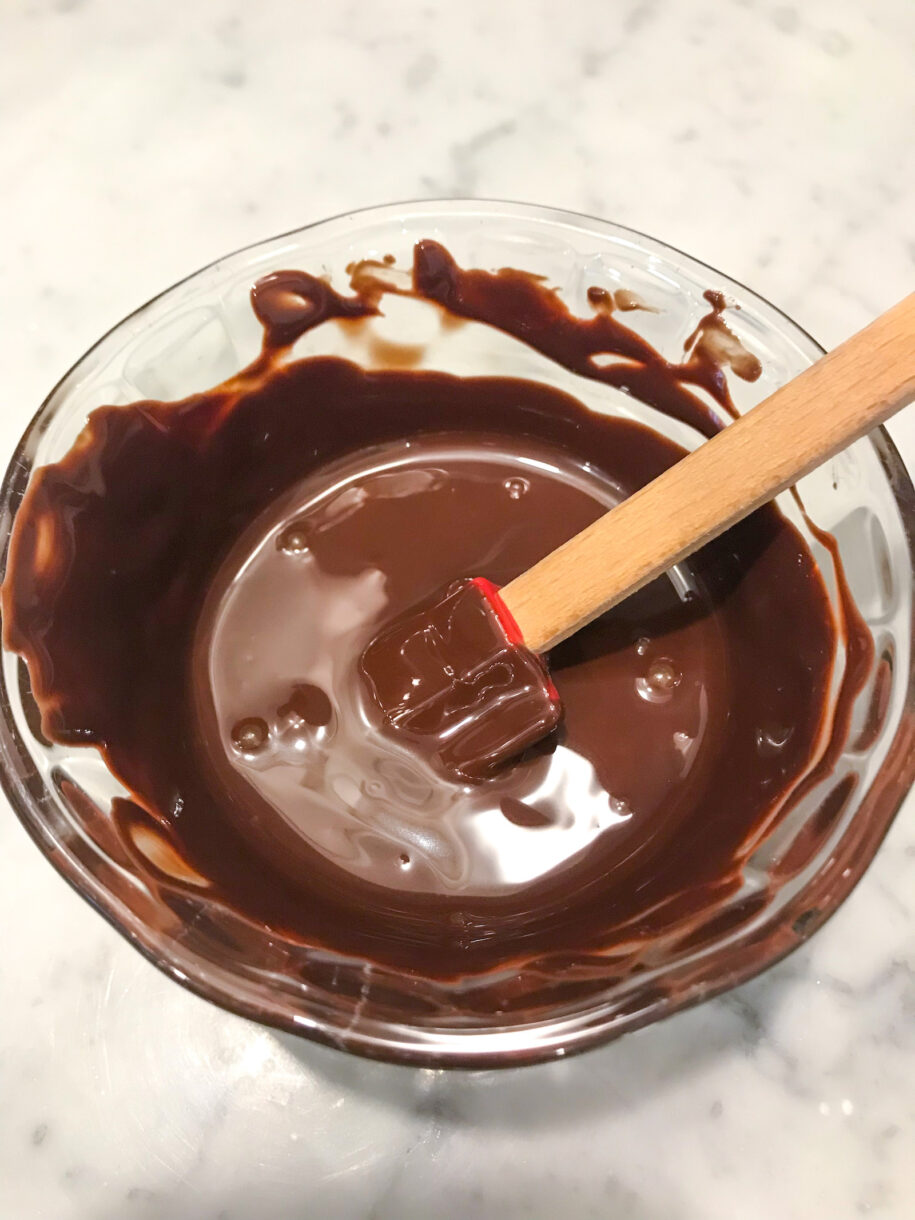 Melted chocolate in a bowl with spatula