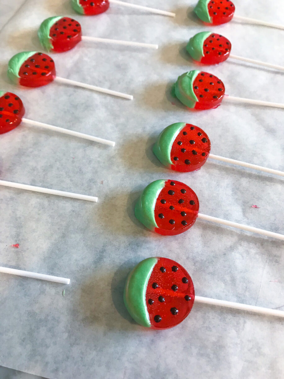 Homemade lollipops decorated to look like watermelon
