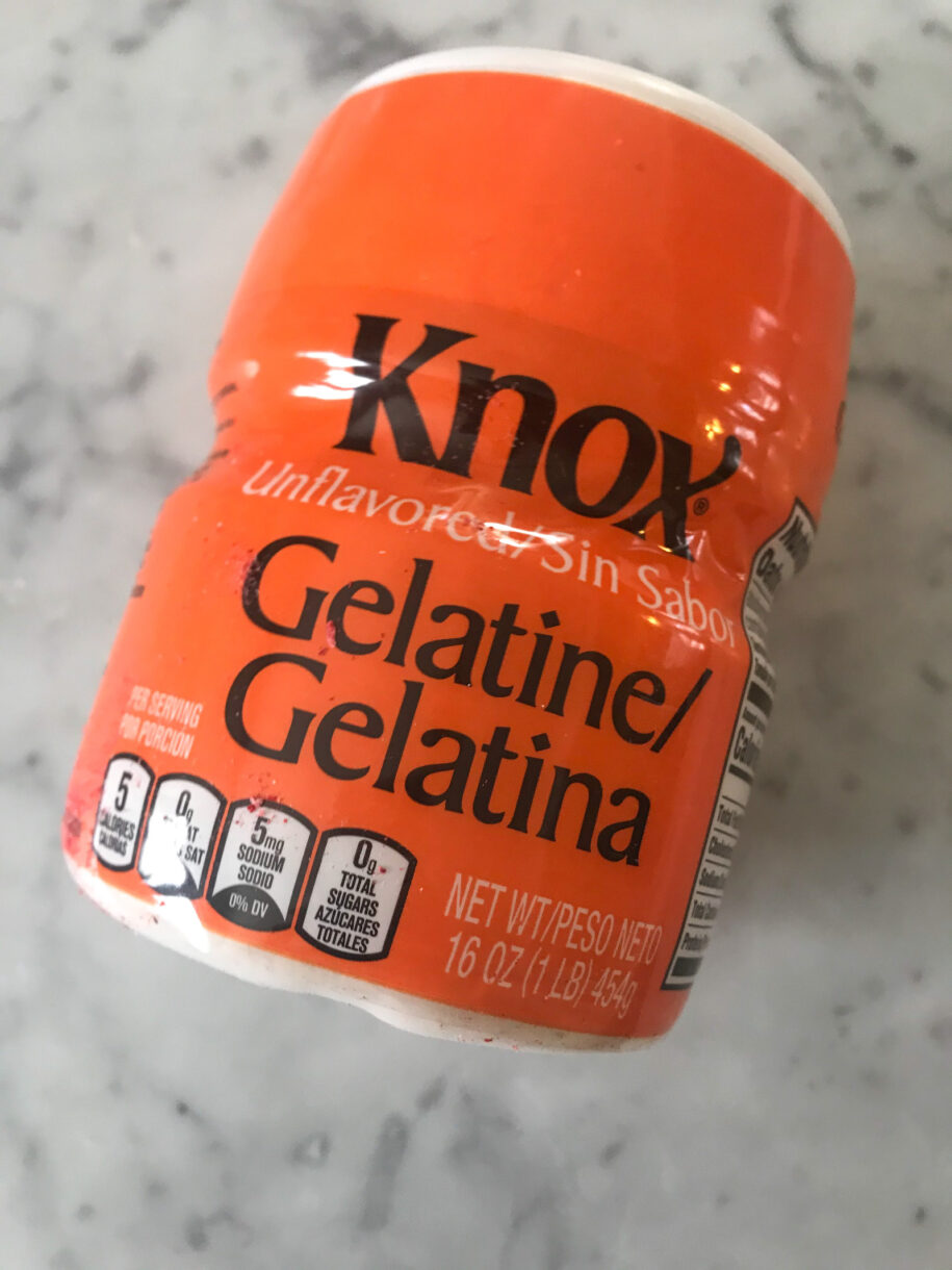 Powdered gelatine by Knox, packaged in an orange tub