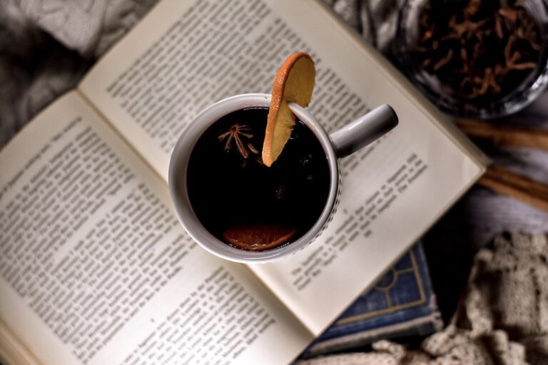 Mulled wine, library books, spices, and cozy fabrics