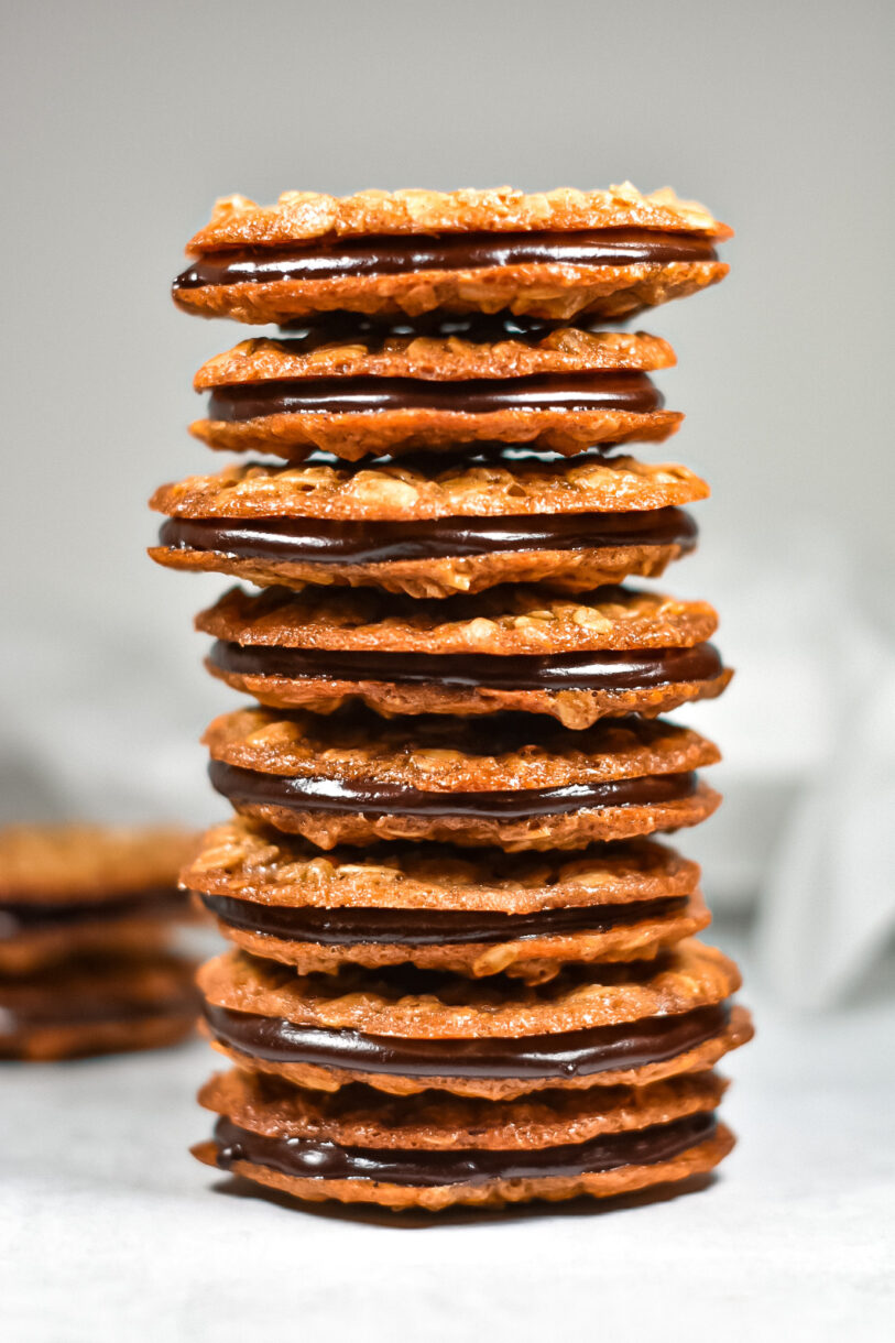 A tall stack of oatmeal sandwich cookies