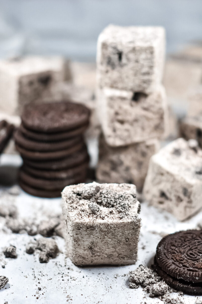 Cookies and cream marshmallows with Oreo cookies scattered around