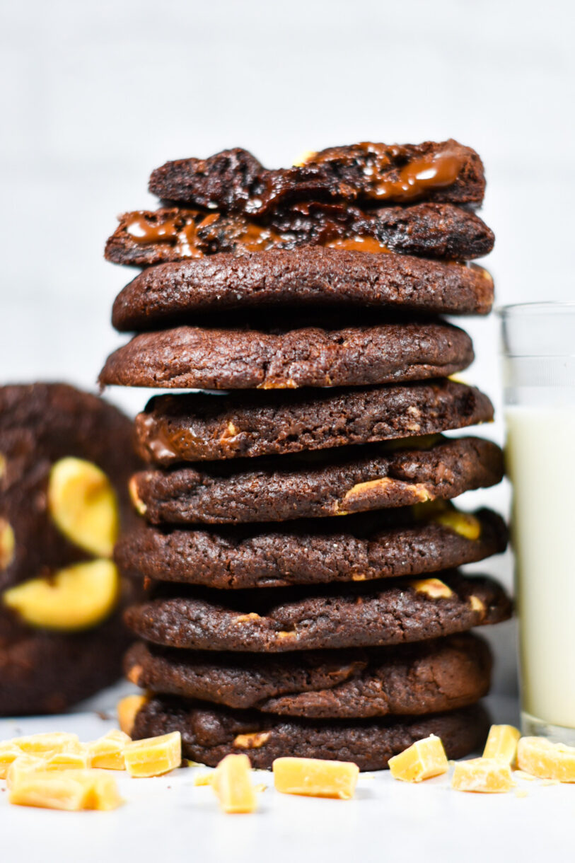 A tall stack of dark chocolate passionfruit cookies