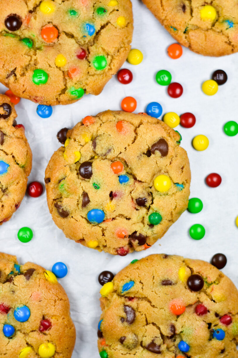 Rainbow M&M Peanut Butter Cookies on a white background, with M&Ms