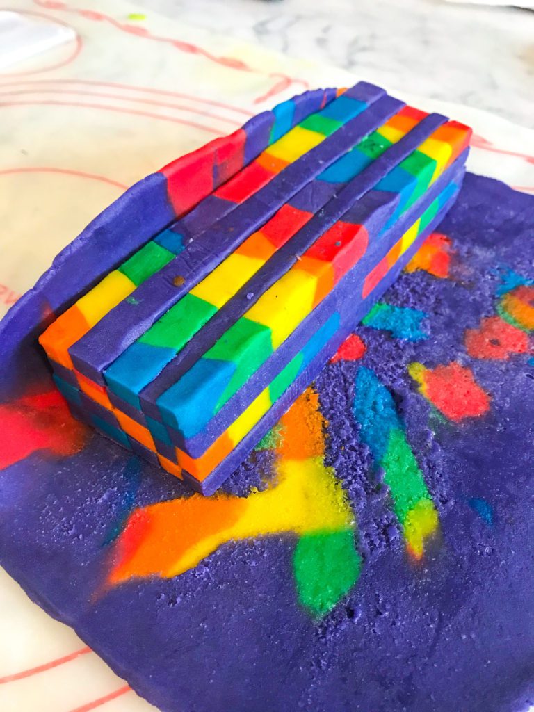 Assembling rainbow checkerboard cookies