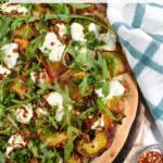 A recipe for grilled peach and goat cheese pizza.