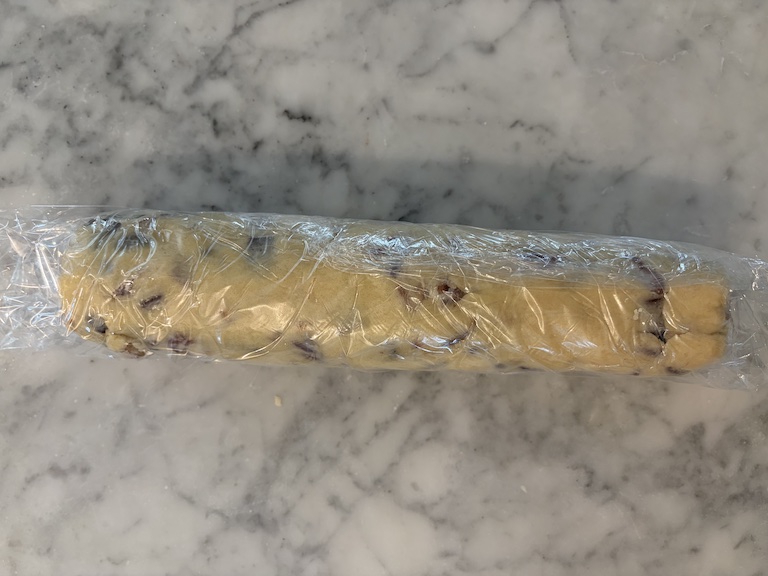 A log of shortbread dough wrapped in clingfilm