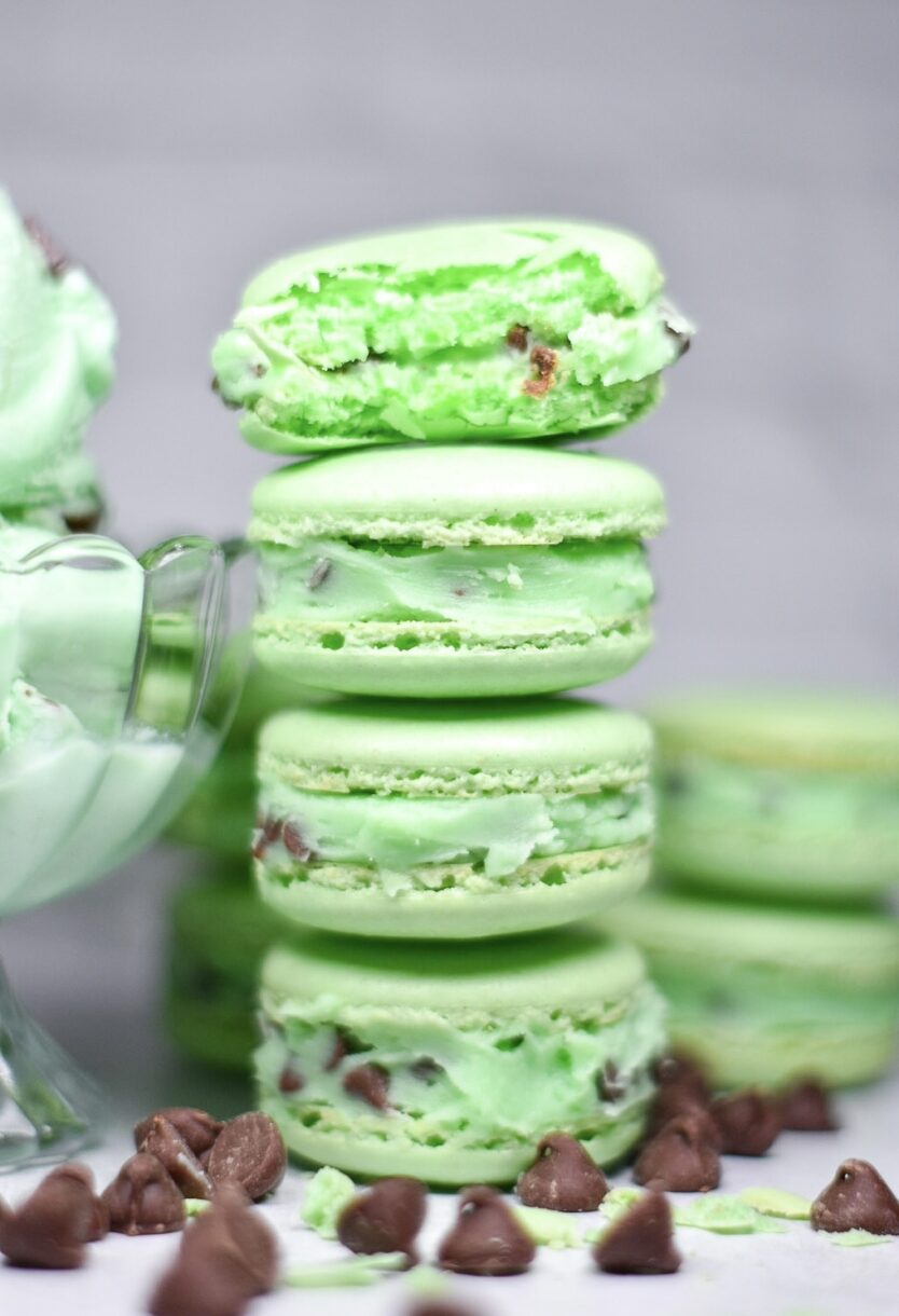 A stack of mint chocolate chip macarons