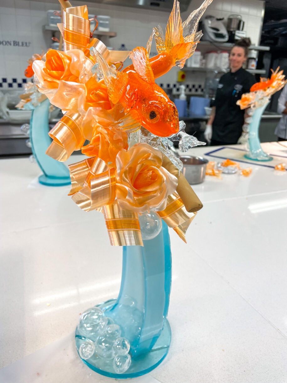 Blue and orange sugar sculpture created in a sugar class at Le Cordon Bleu London