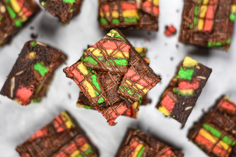 An aerial view of Italian rainbow brownies arranged on a white background
