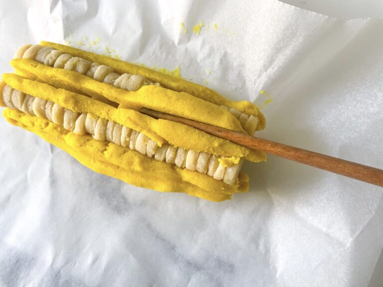 Using chopstick to press dough
