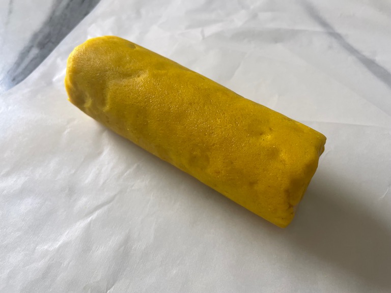 Log of yellow cookie dough