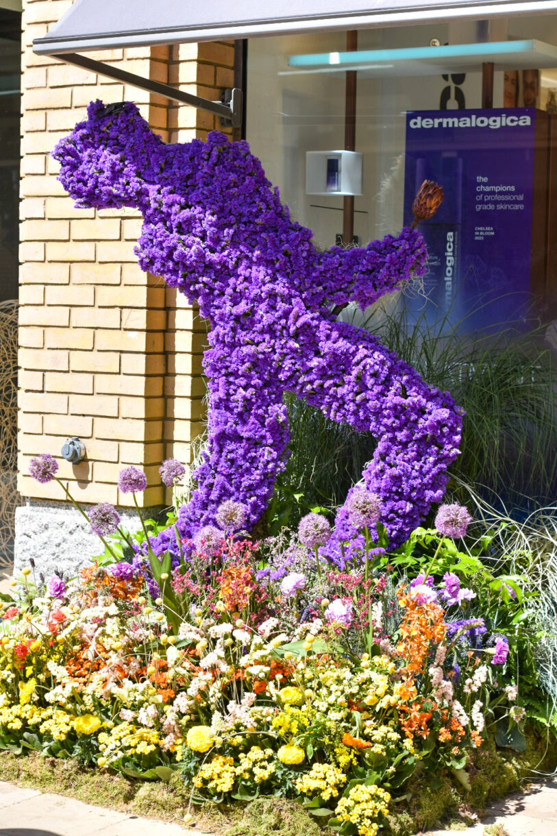 A purple Prince silhouette made out of flowers