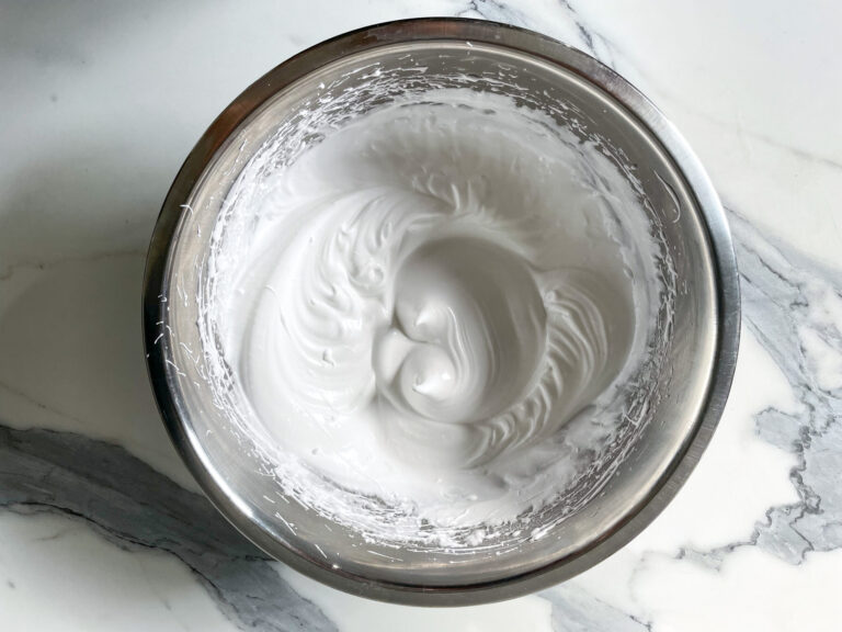 Bowl of egg whites to make meringue cookies recipe