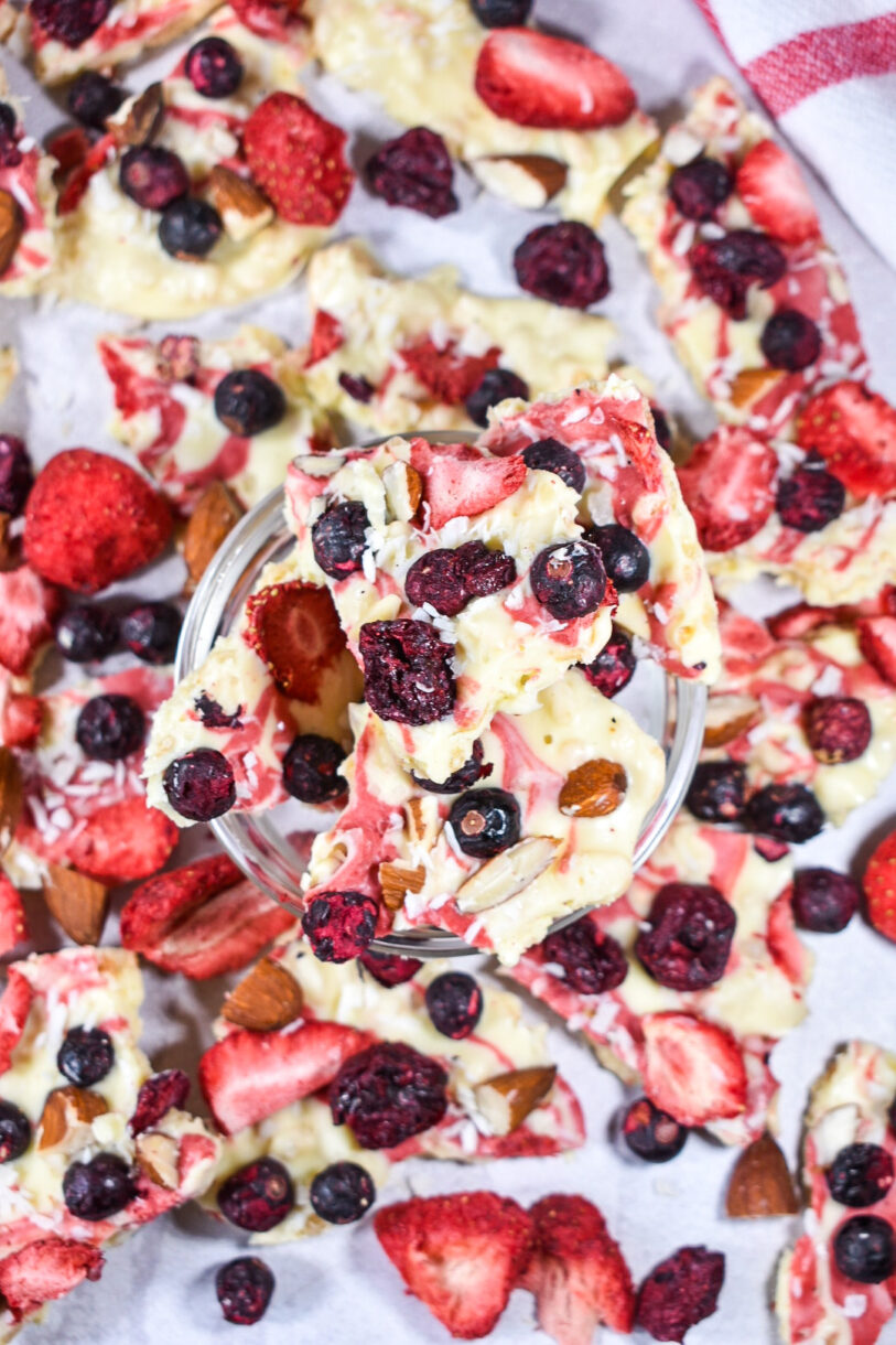 Patriotic berry bark on a white surface with a red and white towel in the background