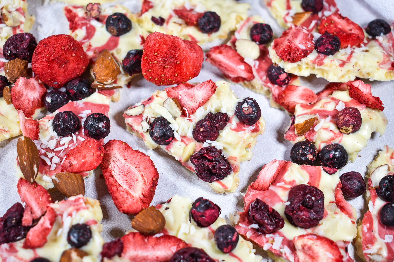 white chocolate berry bark on a white surface