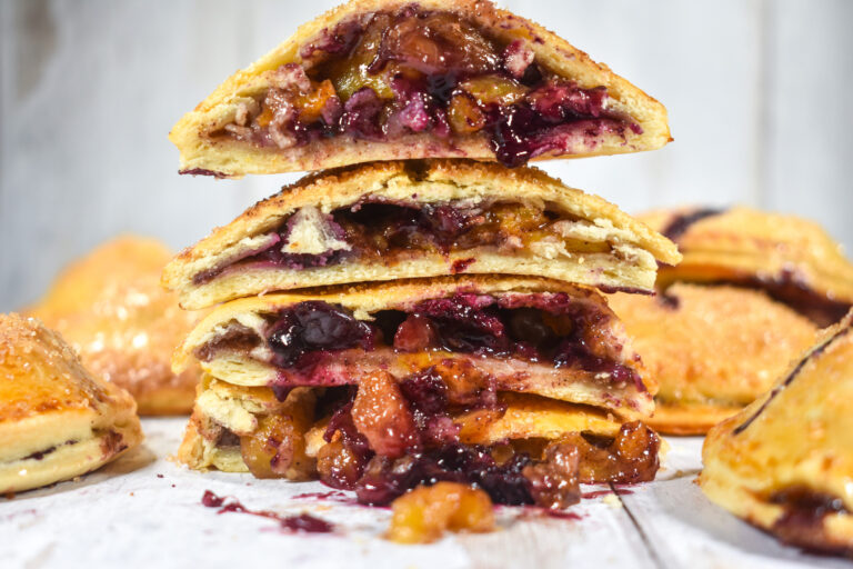 Stack of peach and blueberry hand pies