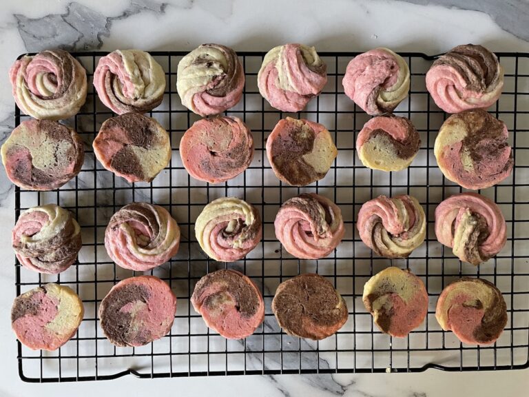 Neapolitan butter cookies on wire cooling rack