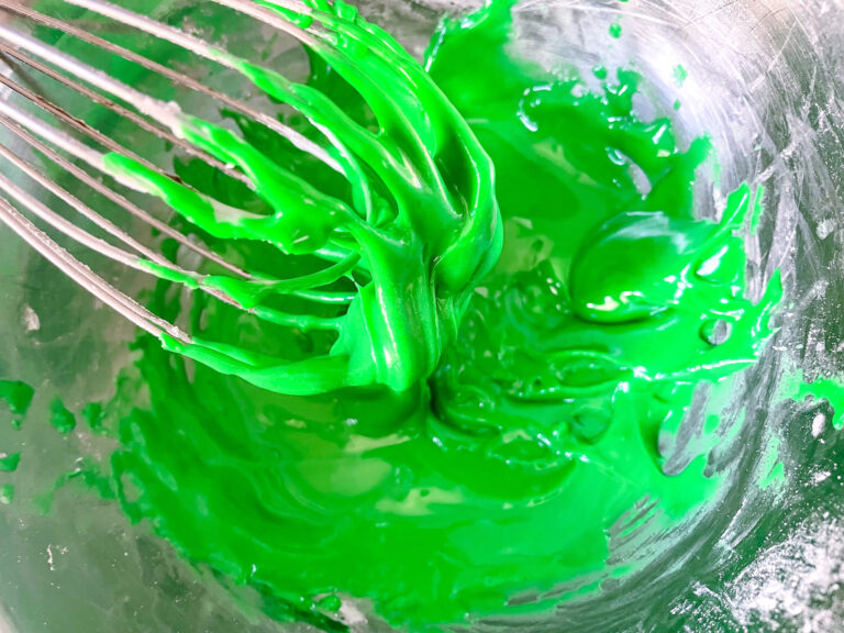 Whisk with green glaze