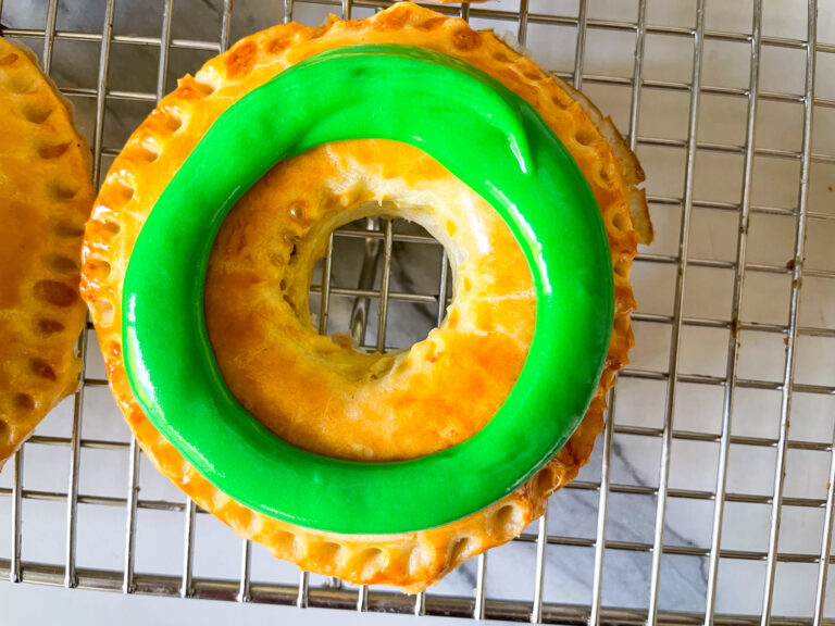 A pastry piped with a ring of green glaze
