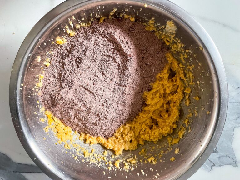 Dry ingredients in metal bowl with butter mixture