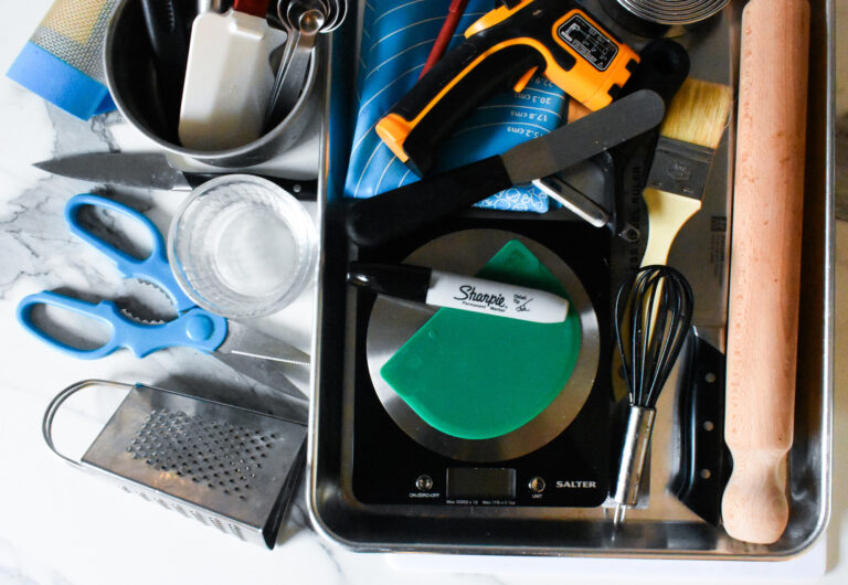 Kitchen tools on marble countertop