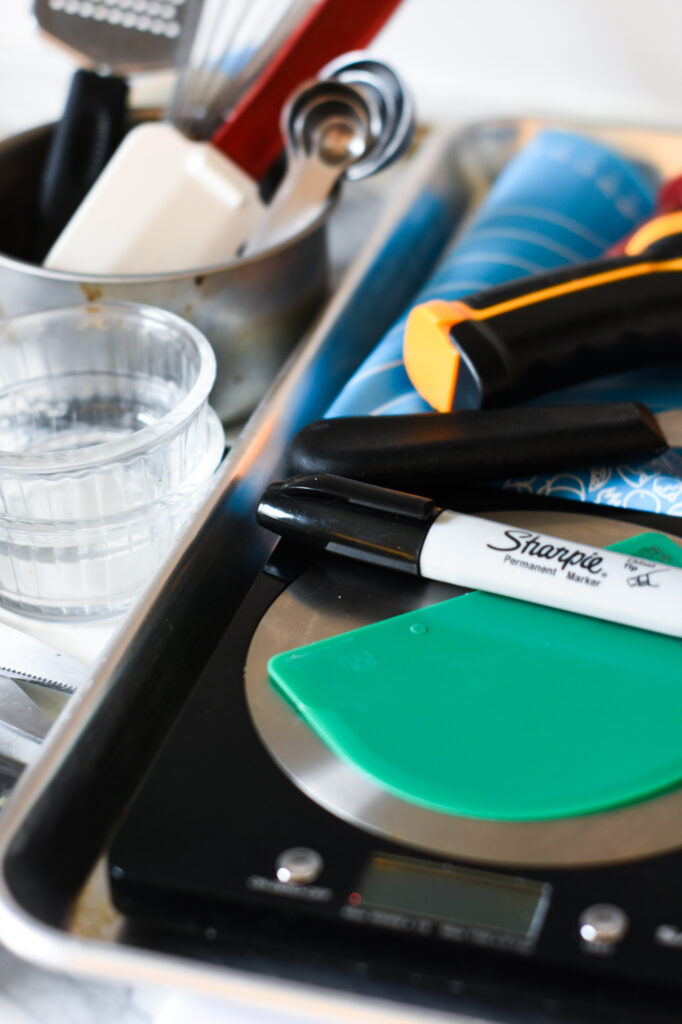 Kitchen tools on marble countertop