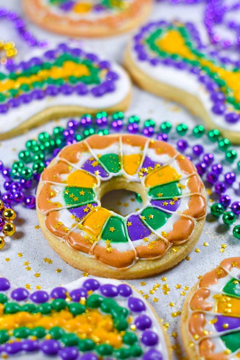 Mardi Gras cookies decorated with gold sprinkles