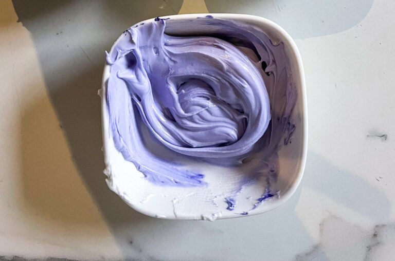 Bowl of purple royal icing
