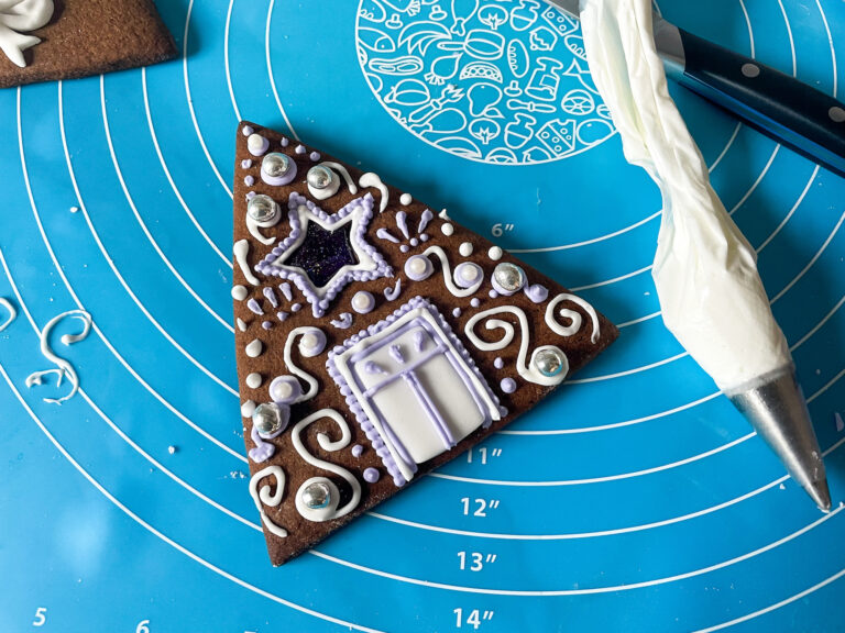 Gingerbread house piece on silicone mat