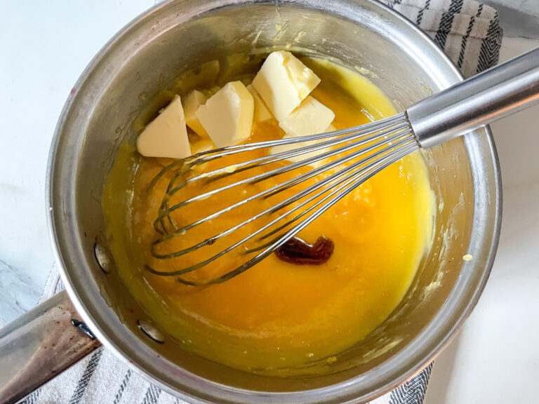 Lemon curd, butter, and vanilla in a saucepan