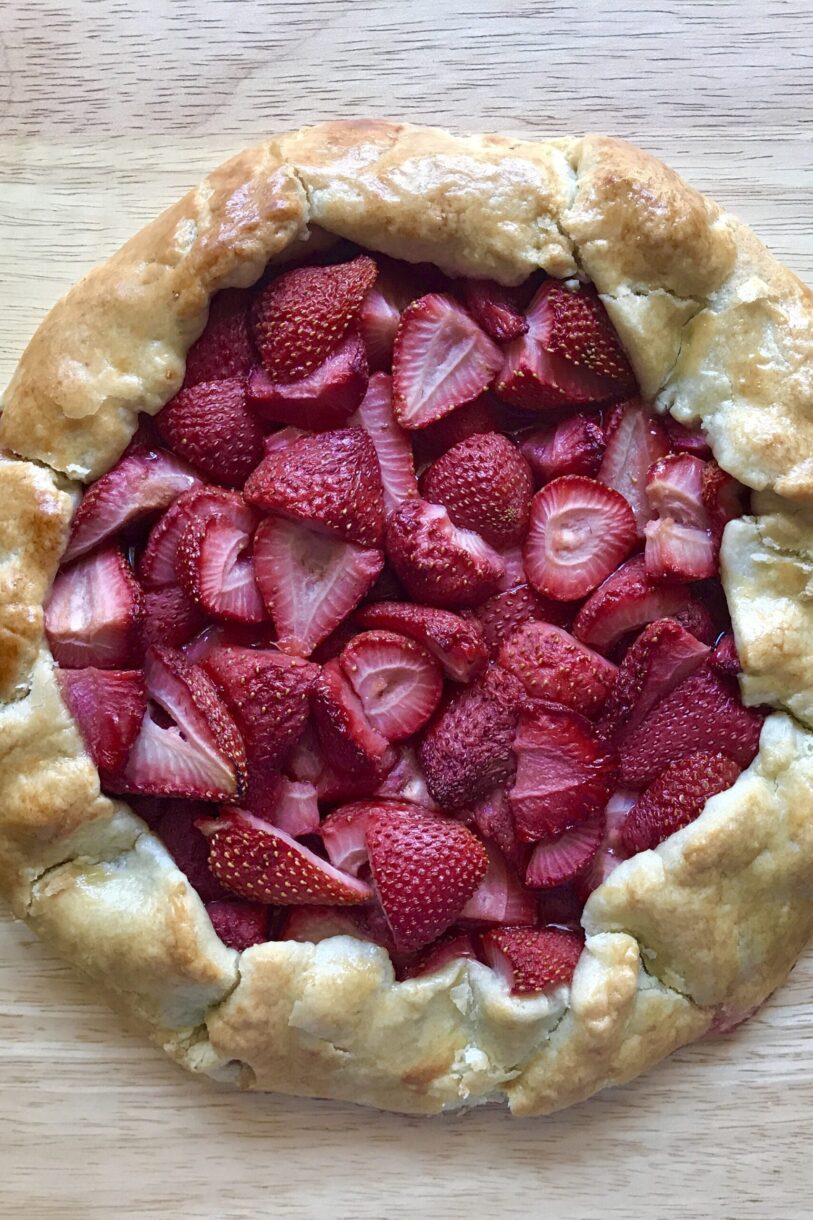 Strawberry galette on wooden surface