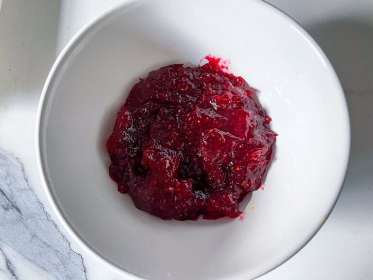 Cranberry compote in white bowl