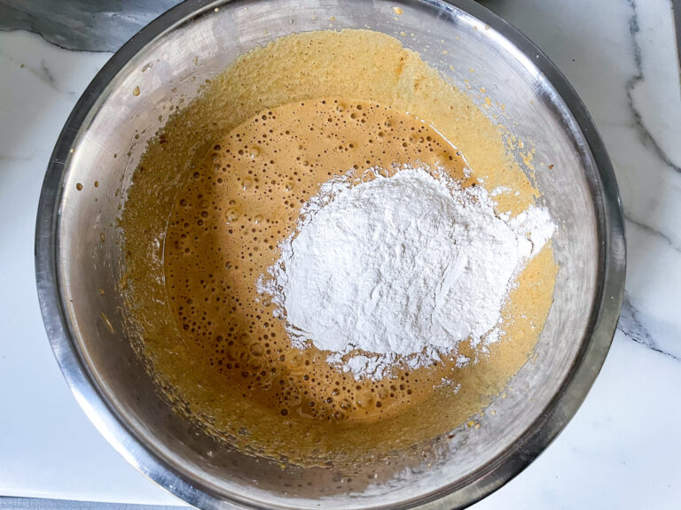 Adding flour to batter