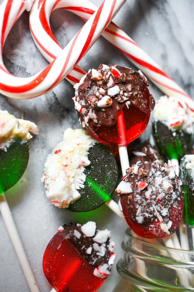 Hard candy peppermint lollipops and a pair of candy canes