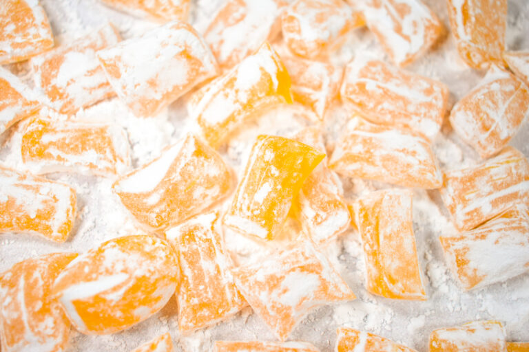Lemon hard candy covered in powdered sugar