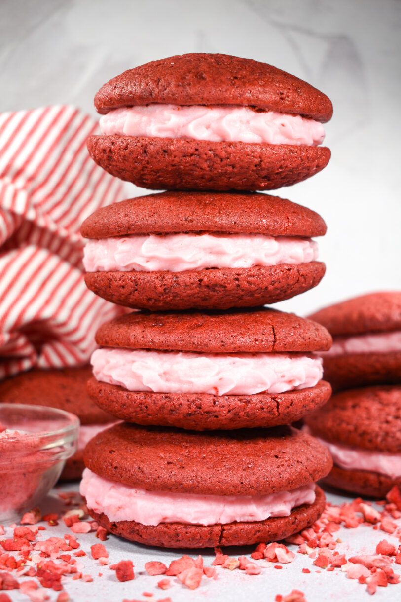 whoopie pie stack with pink frosting and freeze dried strawberries