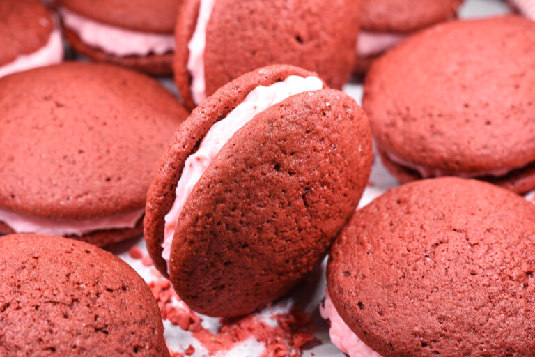 Red velvet whoopie pies with pink frosting