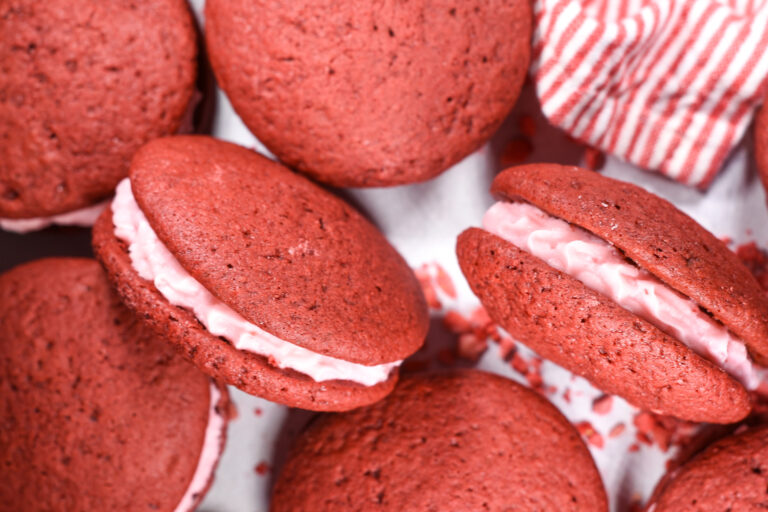 Red velvet whoopie pies and a striped tea towel