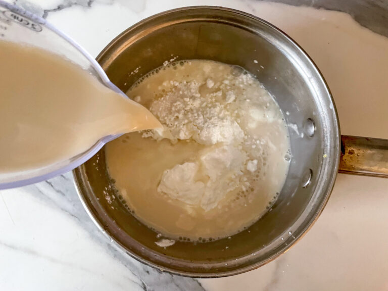 Pouring almond milk into pan