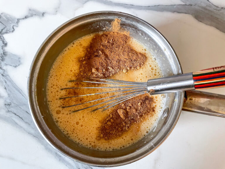 Whisking spices into the pudding