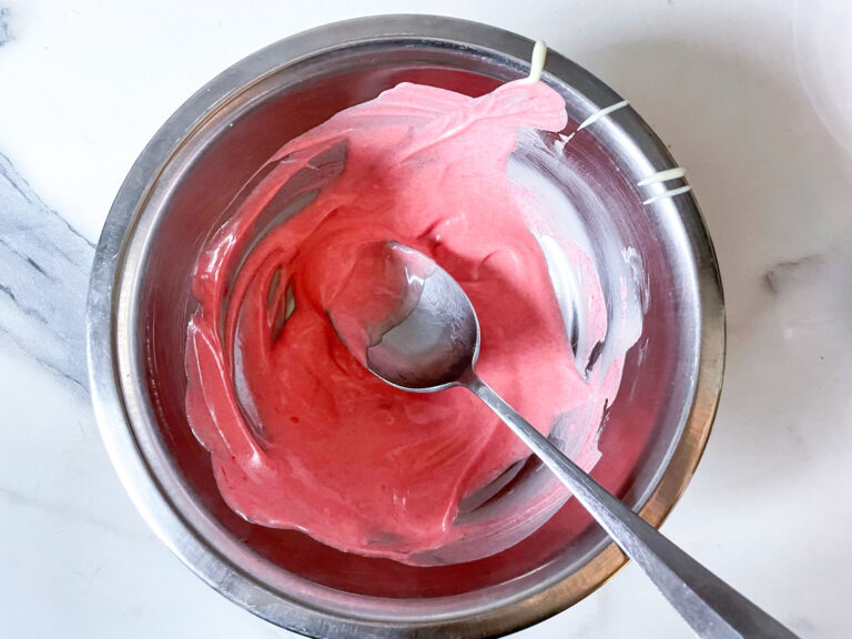 A bowl of melted pink chocolate