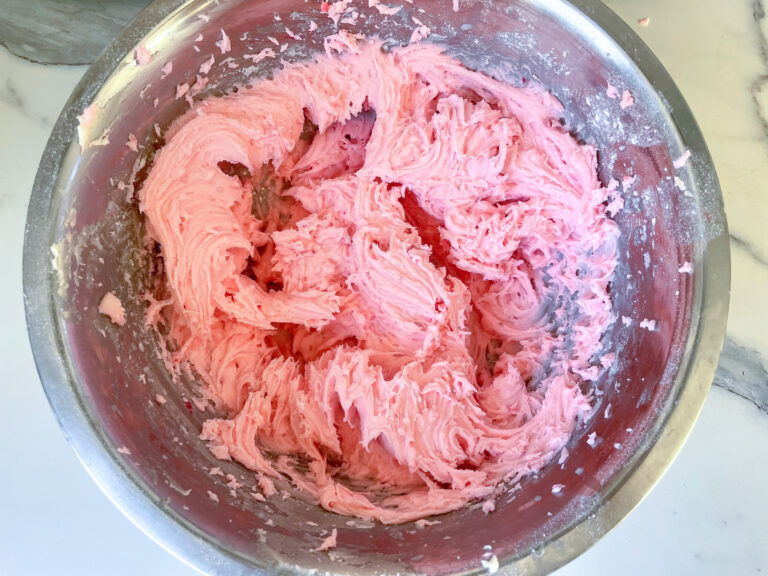 A bowl of pink buttercream