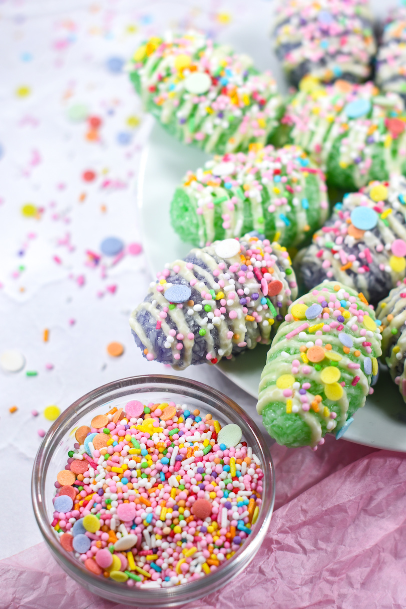 Coconut Easter eggs and a dish of pastel sprinkles