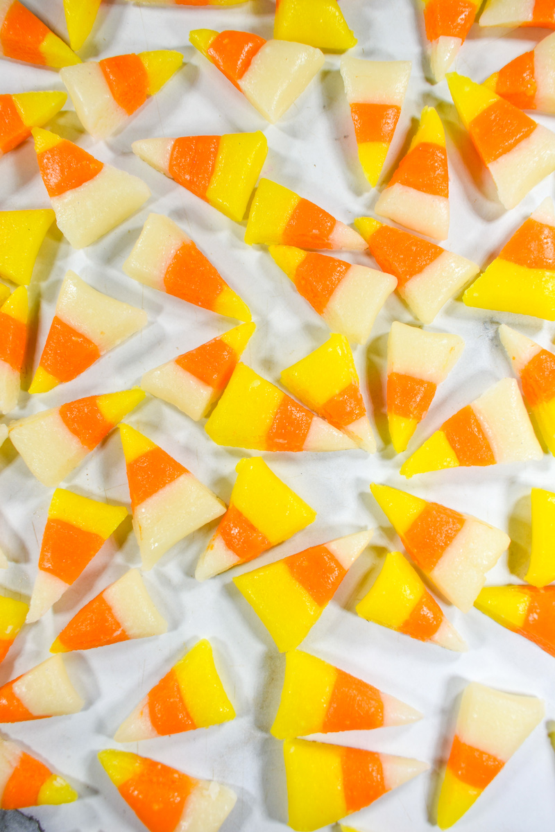 Pieces of yellow, orange, and white Halloween sweets