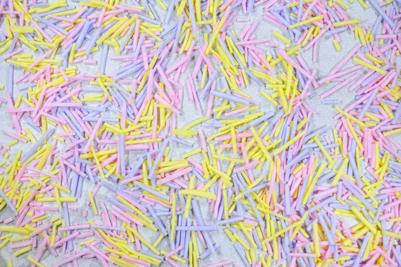 Homemade sprinkles scattered on a countertop