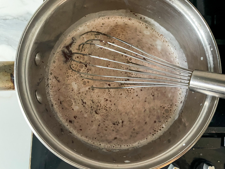 Whisk in a saucepan with milk and chocolate